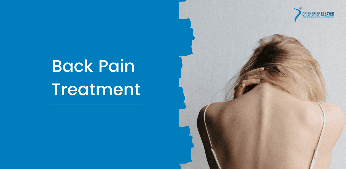 Woman holding her back in pain